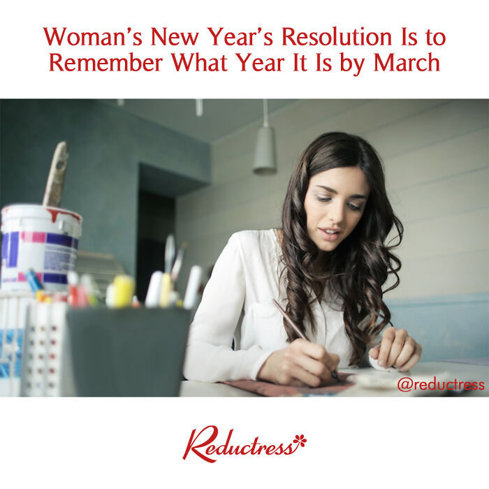 Young woman writing at a desk, illustrating funny fake article headlines from the Reductress online magazine.