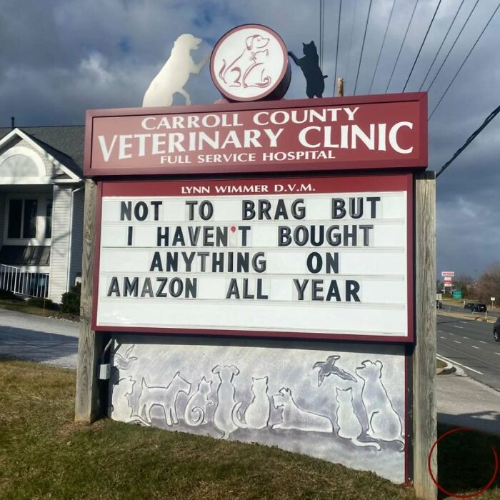 Vet hospital sign with witty joke about avoiding Amazon purchases for a year.