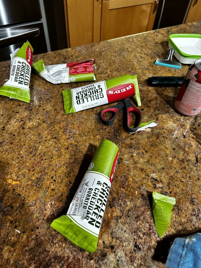 Dad prepares Grilled Chicken burritos on a kitchen counter, showcasing the rewarding moments of fatherhood.