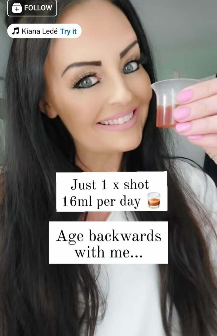 Woman smiling holding a small shot glass, illustrating hilarious Instagram vs. reality moments on social media photos.