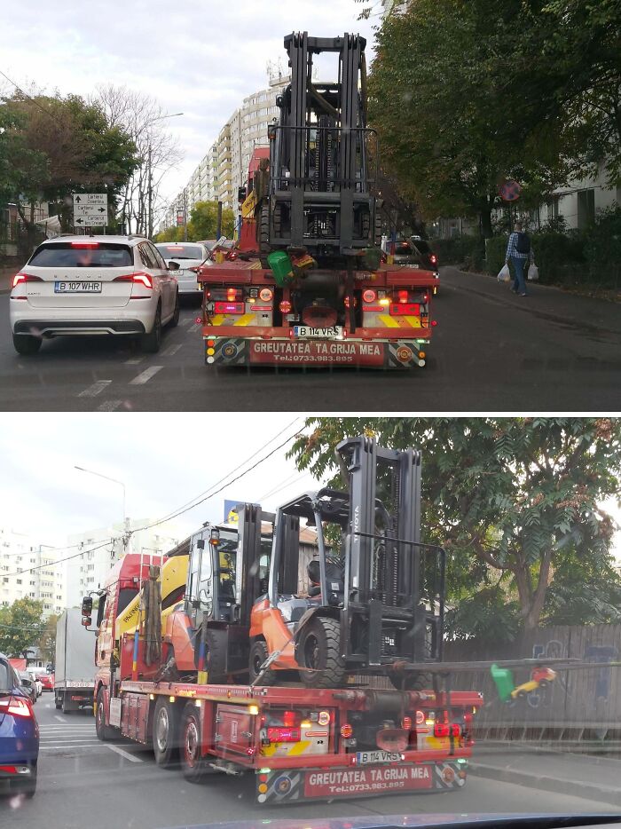 A forklift precariously loaded on a flatbed truck, illustrating risky driving behavior in traffic.