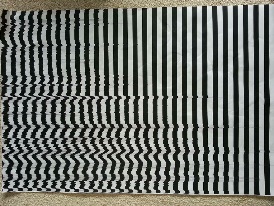 Abstract pattern with black and white distorted stripes resembling accidental art.