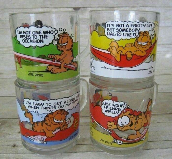 80s nostalgia with Garfield cartoon mugs featuring witty comic strips by Jim Davis.