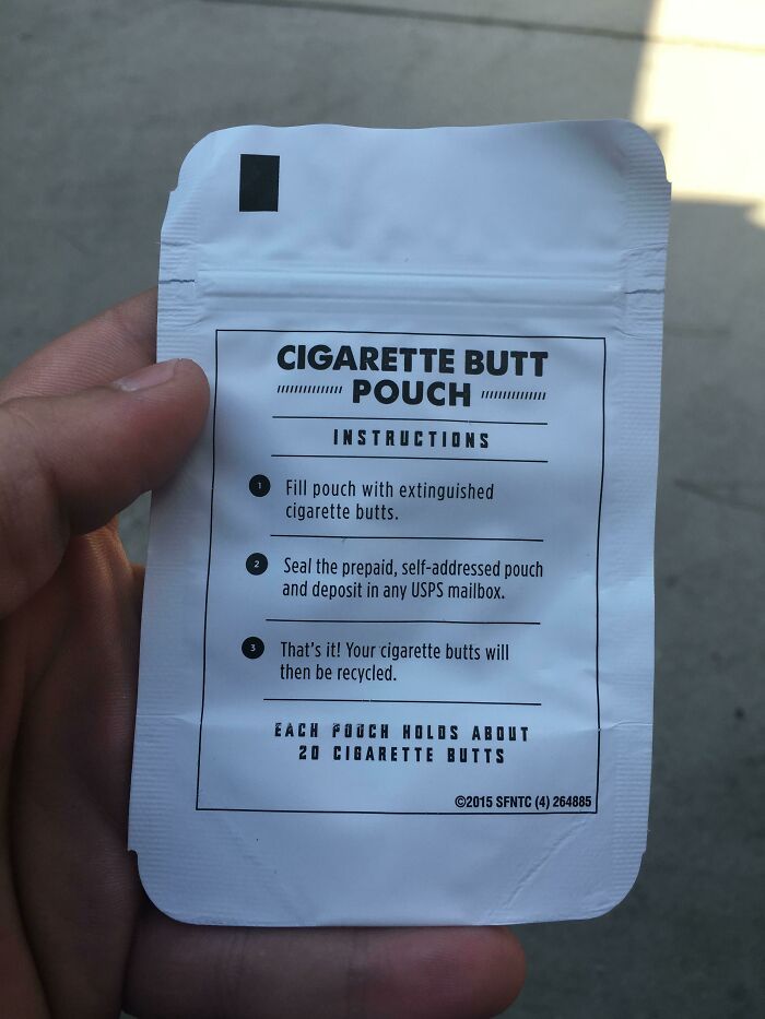 Cigarette b**t pouch for recycling, held in hand, with instructions visible, showcasing cool products with surprises.