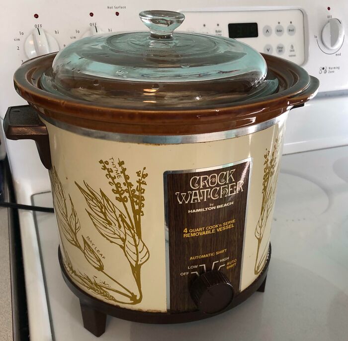 Vintage 80s Crock Watcher slow cooker with a floral design on a kitchen stove.
