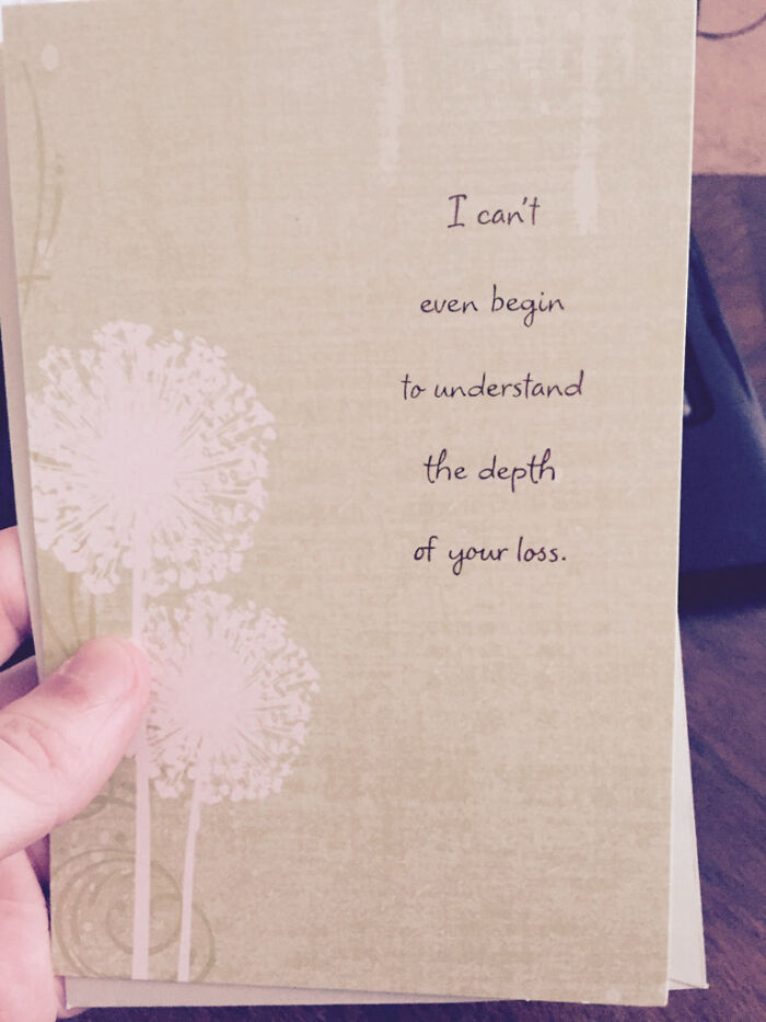 Sympathy card with dandelion design, expressing deep condolence.