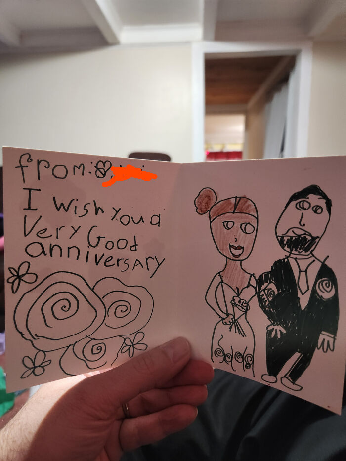 Child's drawing of a couple in an anniversary card, featuring funny and wholesome illustrations and hand-lettered message.