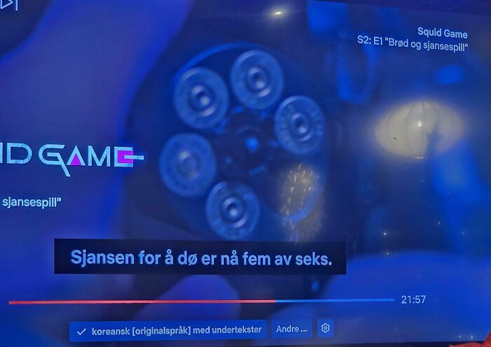 Close-up of Squid Game S2 scene with Norwegian subtitles and a revolver hinting at a clue.