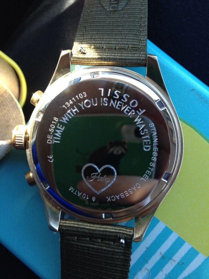 Engraved watch back with a heart, symbolizing funny wholesome anniversary surprises.