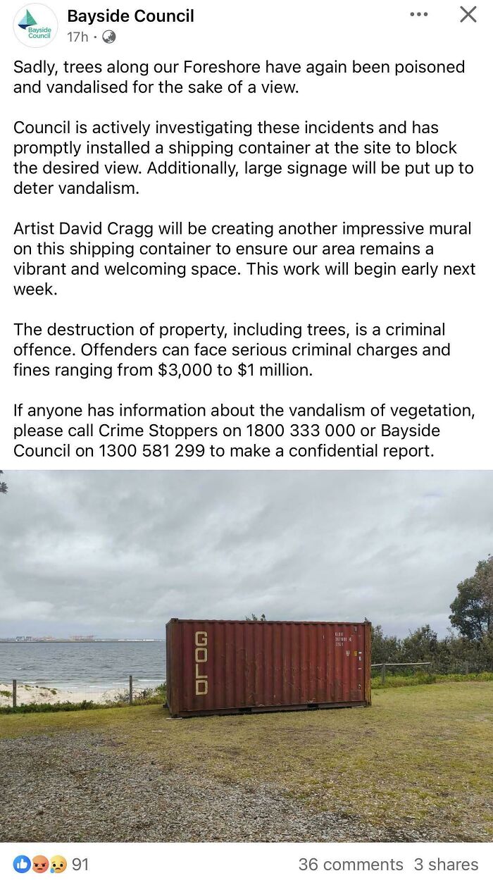 Shipping container on Australian foreshore with warning about vandalism and efforts to preserve natural views.