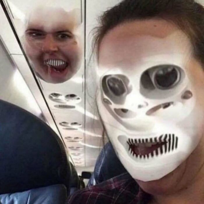 Two people on a plane applying face filters that distort their faces in random photos with unusual effects.