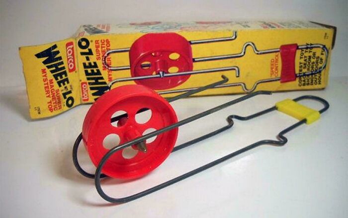 Vintage Whee-Lo toy with red wheel and metal frame, a nostalgic photo that might make you say heck I’m old