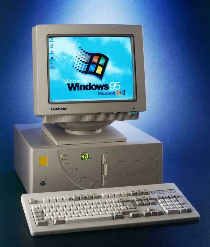 Vintage 90s desktop computer with Windows 95 startup screen, representing the wild 90s tech nostalgia.