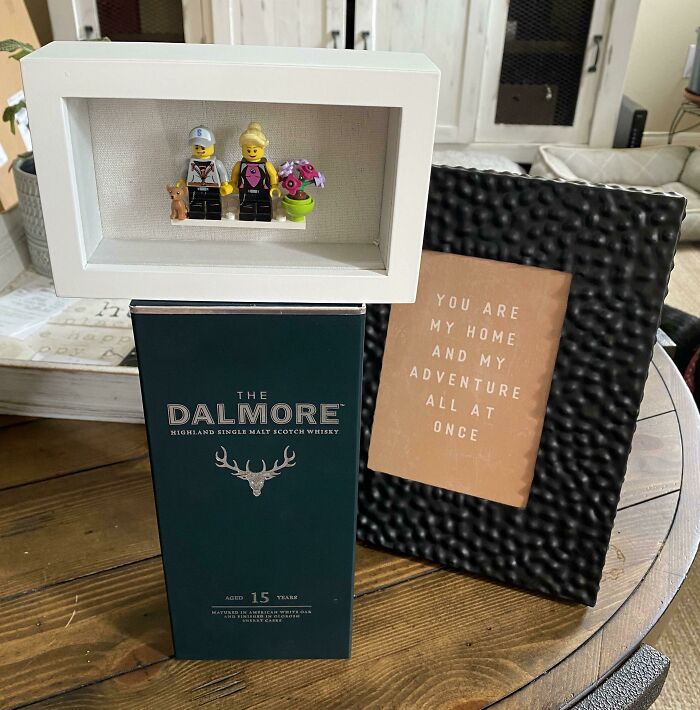 Framed Lego couple and whiskey box as a funny wholesome anniversary surprise.