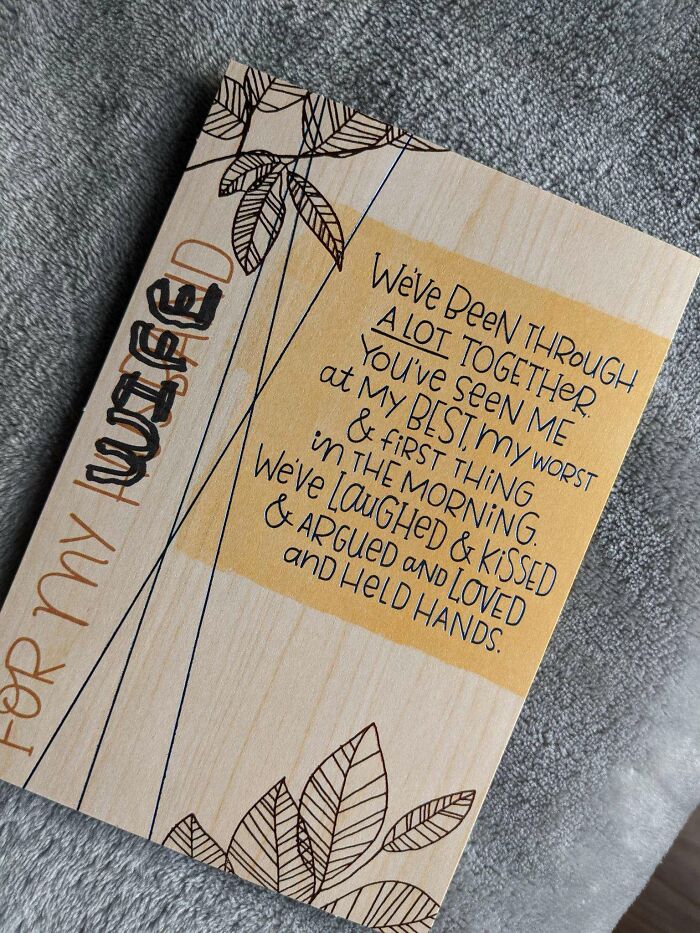 Anniversary card with a heartfelt message for a wife, featuring leaves and warm tones.