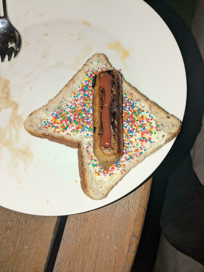 Australian snack with sprinkles on bread and chocolate-topped banana, highlighting the quirky culinary style.