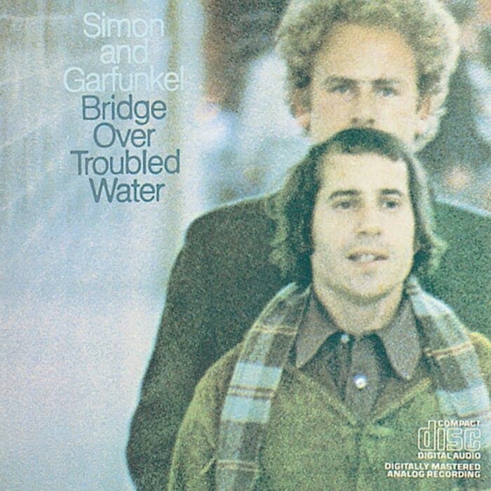 Album cover of Simon and Garfunkel's "Bridge Over Troubled Water," a classic '70s song.
