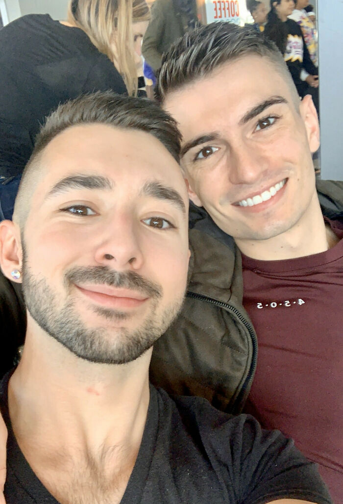 Two men smiling together, showcasing a happy long-distance relationship moment.