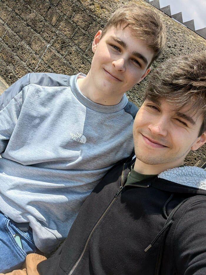 Two people smiling together outdoors, symbolizing long-distance love.