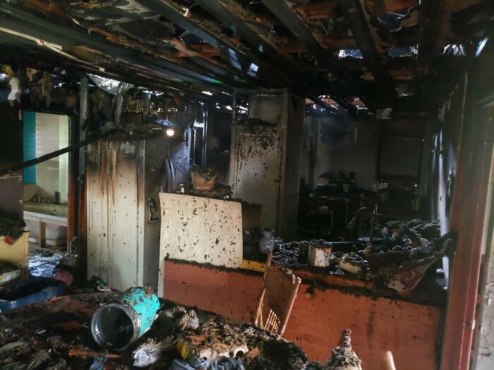 Charred room showing fire aftermath, illustrating nature disaster resilience.