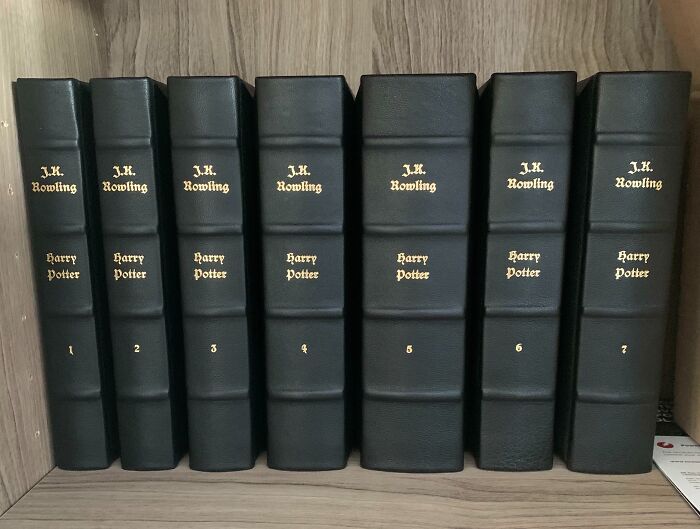 Leather-bound Harry Potter book set displayed on a shelf, perfect for funny wholesome anniversary surprises.