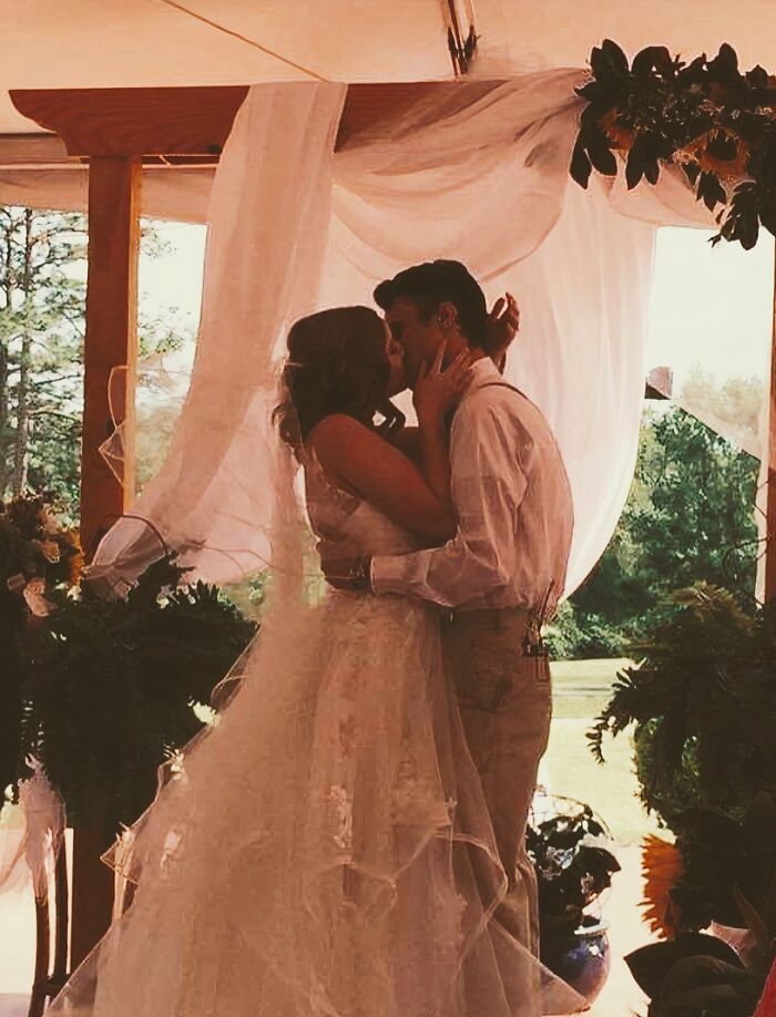 Couple kissing at a wedding altar, symbolizing long-distance love enduring challenges.