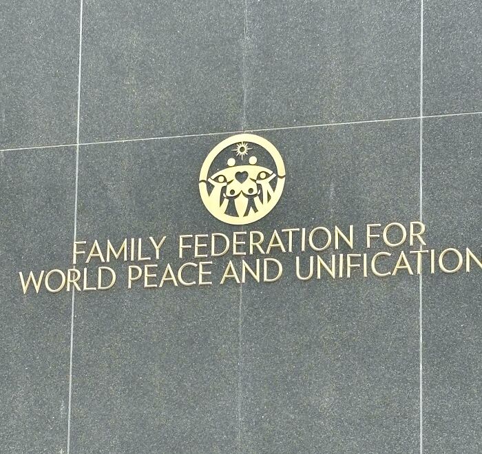 Logo For The Family Federation For World Peace And Unification Found Across The Street From My Apartment Appears To Contain B***s