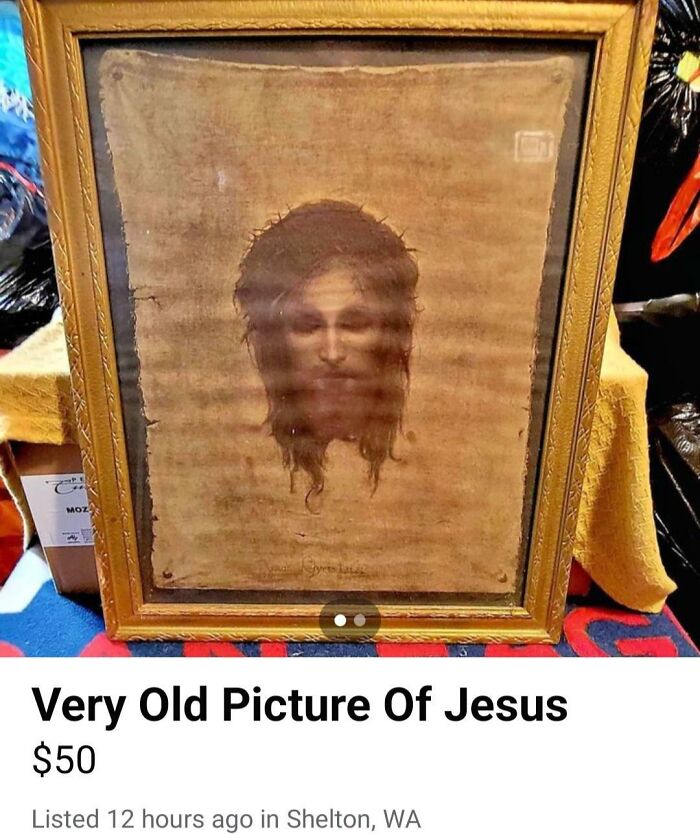 Framed vintage image of Jesus on a textured cloth, considered creepy to some, available for purchase online.