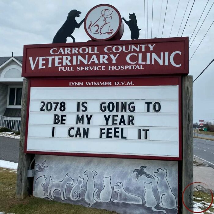 Veterinary clinic sign with the joke: "2078 is going to be my year, I can feel it."