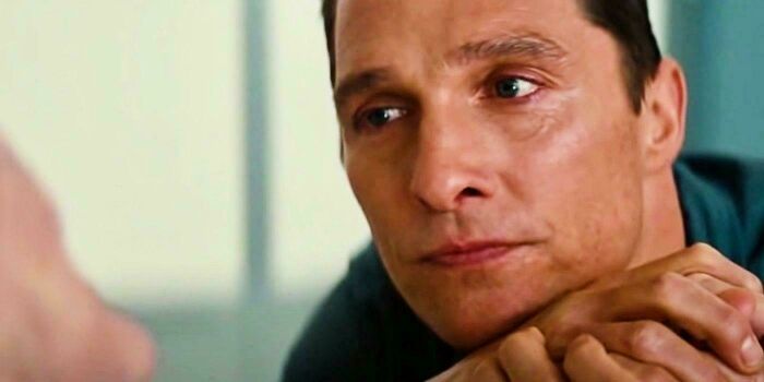 Close-up of a man with an intense gaze, highlighting questionable movie details that cinephiles mock online.