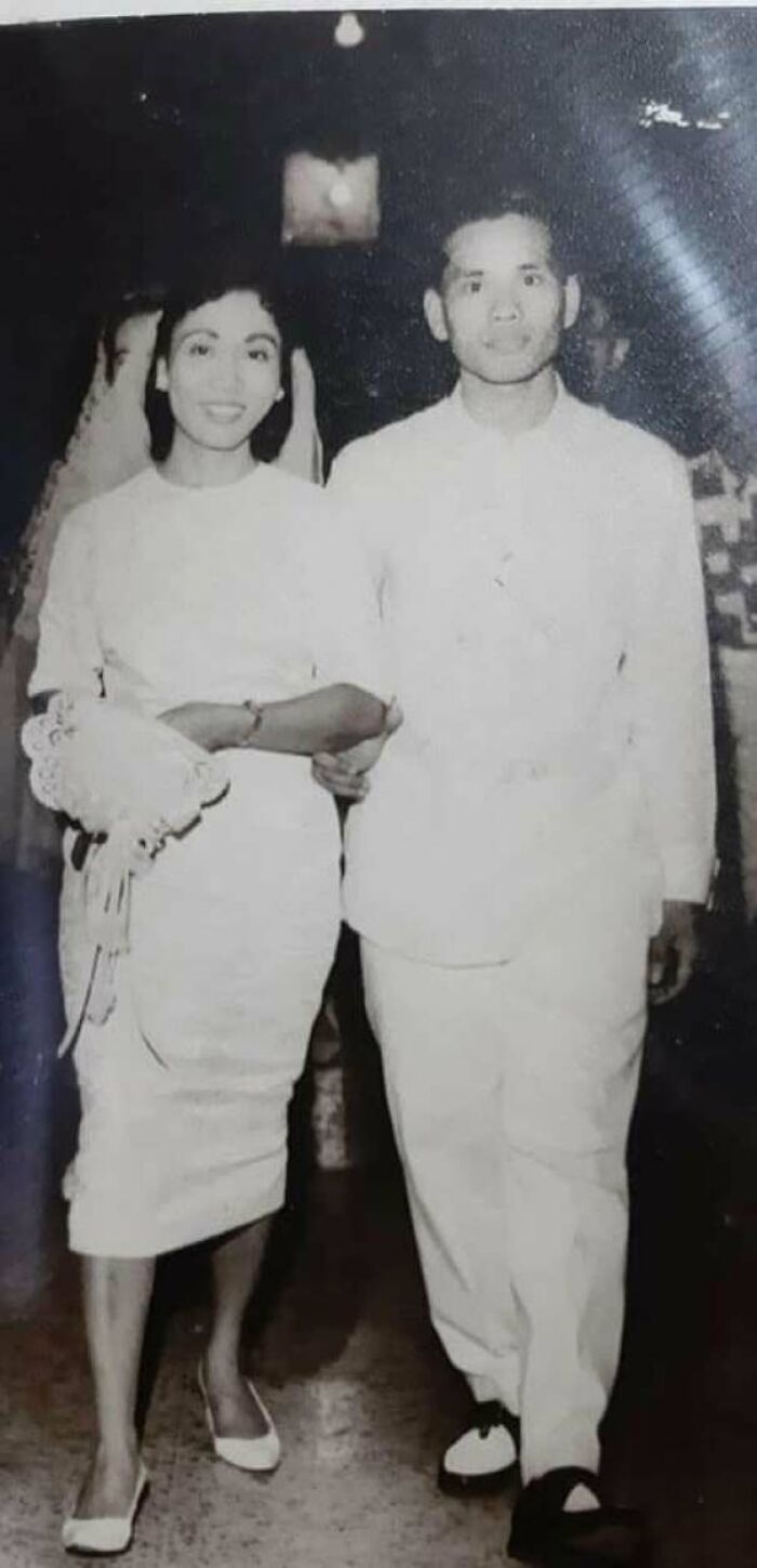 Black and white old image of a smiling couple dressed formally, showcasing fascinating moments from history class unseen photos.