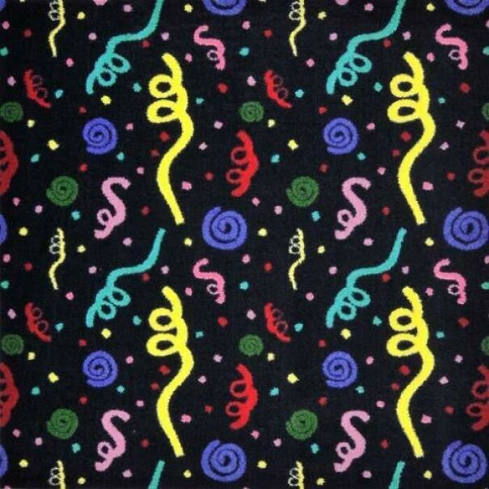 Colorful '90s pattern with squiggles and shapes on a black background.