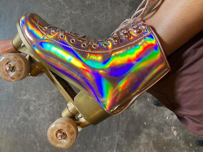 Shiny retro roller skate with holographic finish and glittery wheels, perfect for nostalgic old soul style.