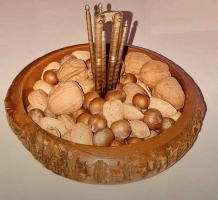 Wooden bowl filled with assorted nuts, reminiscent of childhood memories.