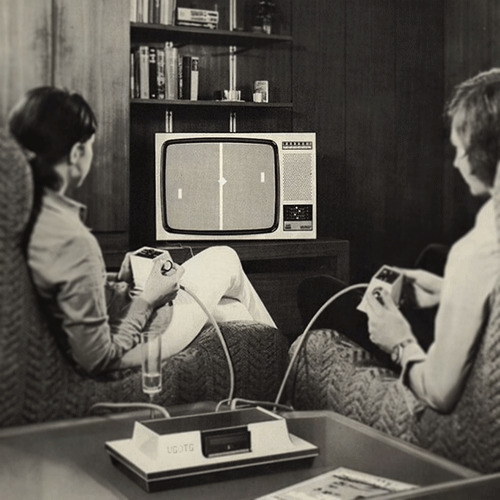 Two people playing a vintage video game on a retro TV, evoking childhood nostalgia.