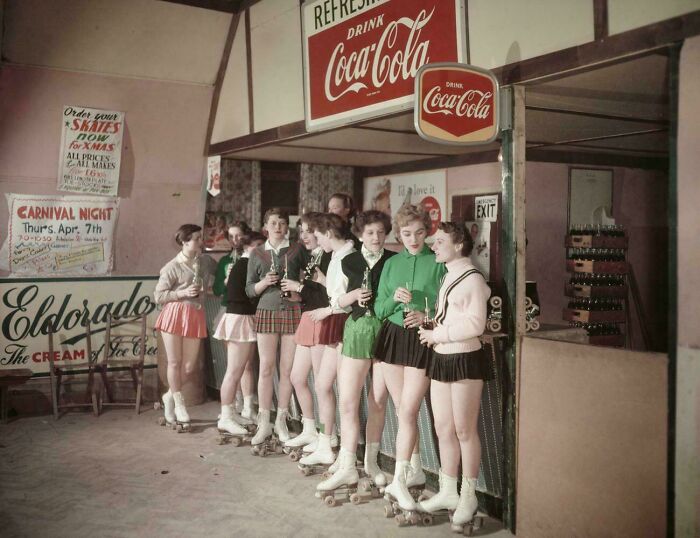 Group Of Women At The Roller Skate Ring, Have A Coke While They Rest A Little. Mid 1950s
