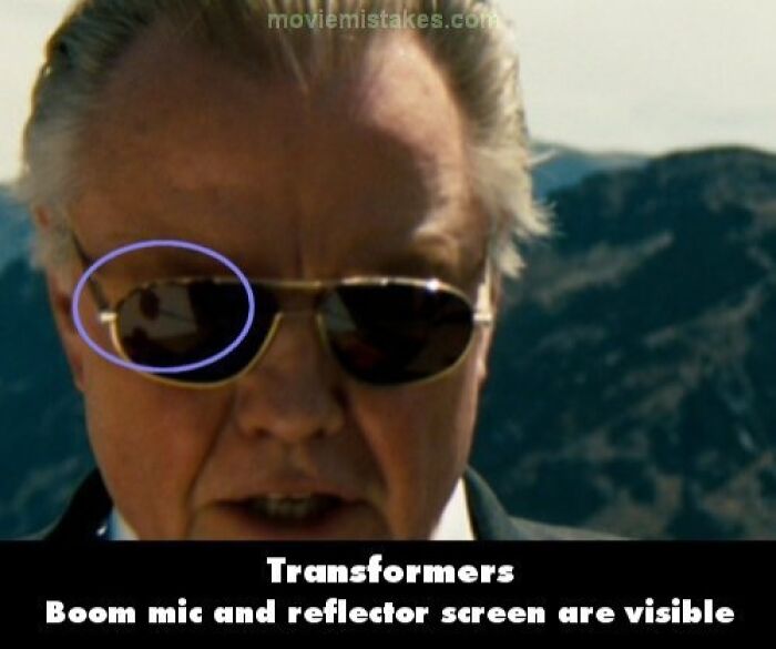 Actor wearing sunglasses with a boom mic and reflector screen visible, highlighting funny movie mistakes.