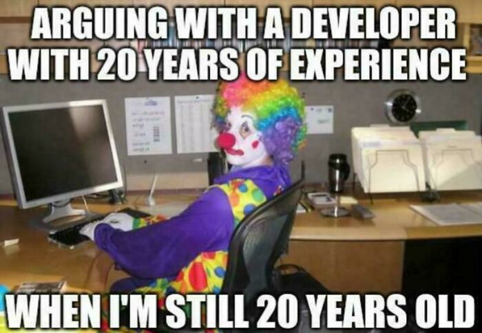 Clown at a computer in a programmer meme about arguing with an experienced developer.