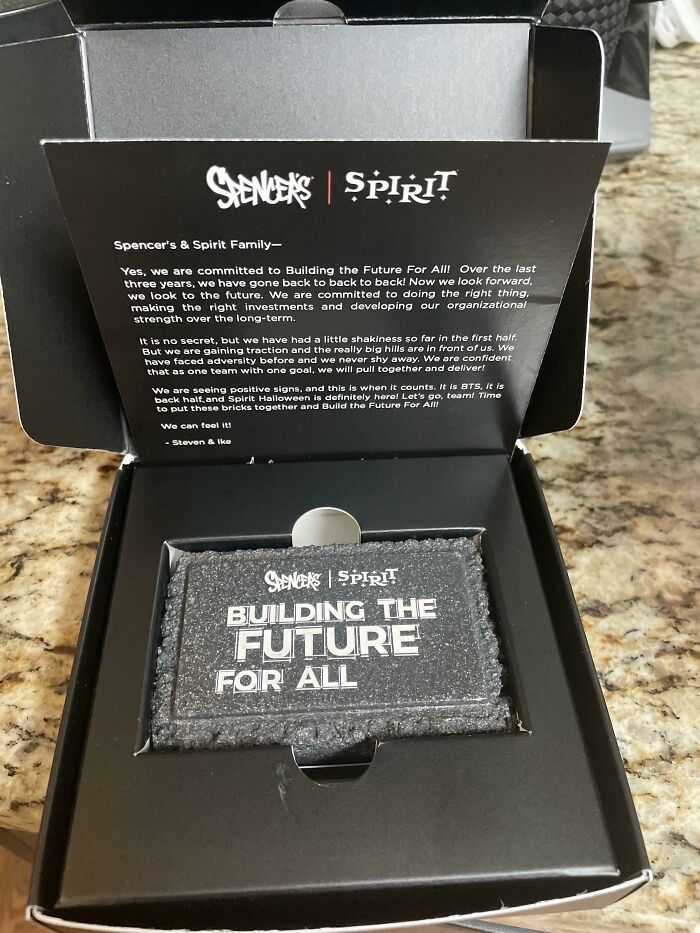 Infuriating company gift box with a card that reads "Building the Future for All" from Spencer’s and Spirit.