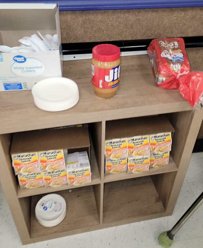 Company gift display with peanut butter, bread, and instant noodles.