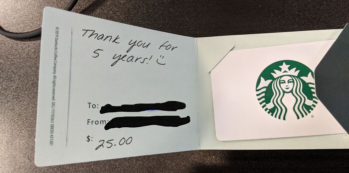 $25 Starbucks gift card with handwritten note, infuriating company gift for 5-year service.