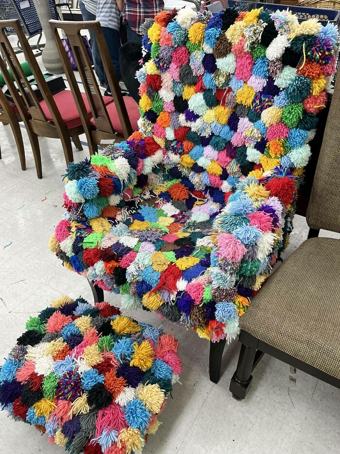 Colorful, fluffy chair and footstool made from pom-poms, showcasing weird and wonderful secondhand finds.