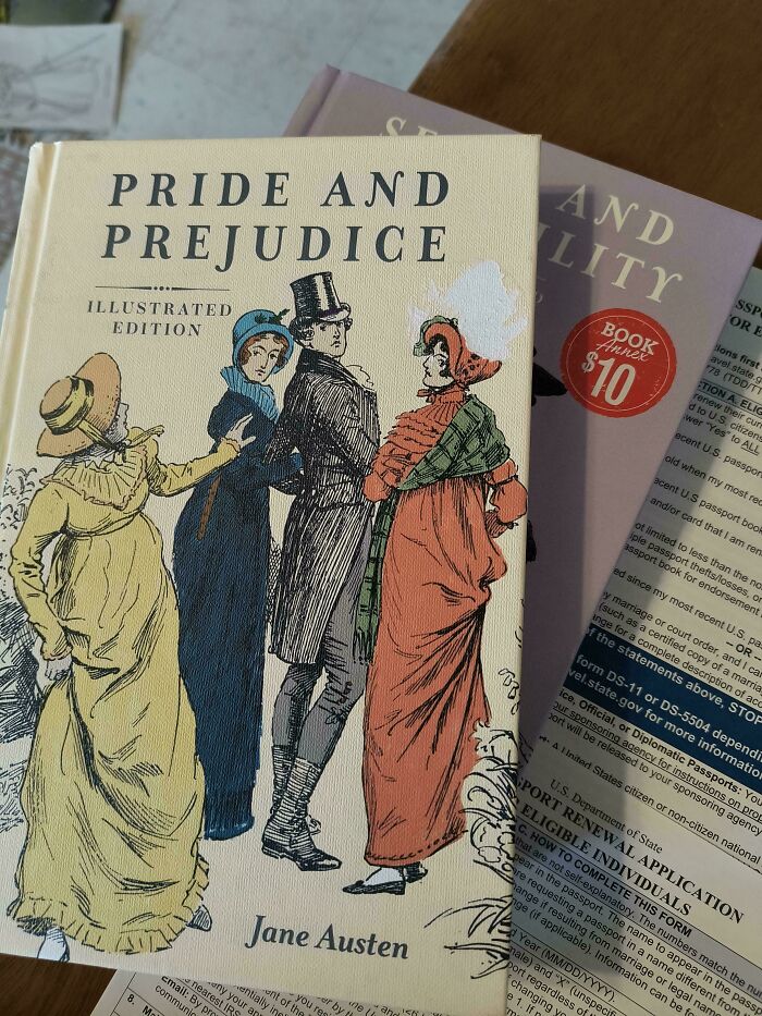 "Online shopping fail with mismatched book covers of classic novels on a desk."