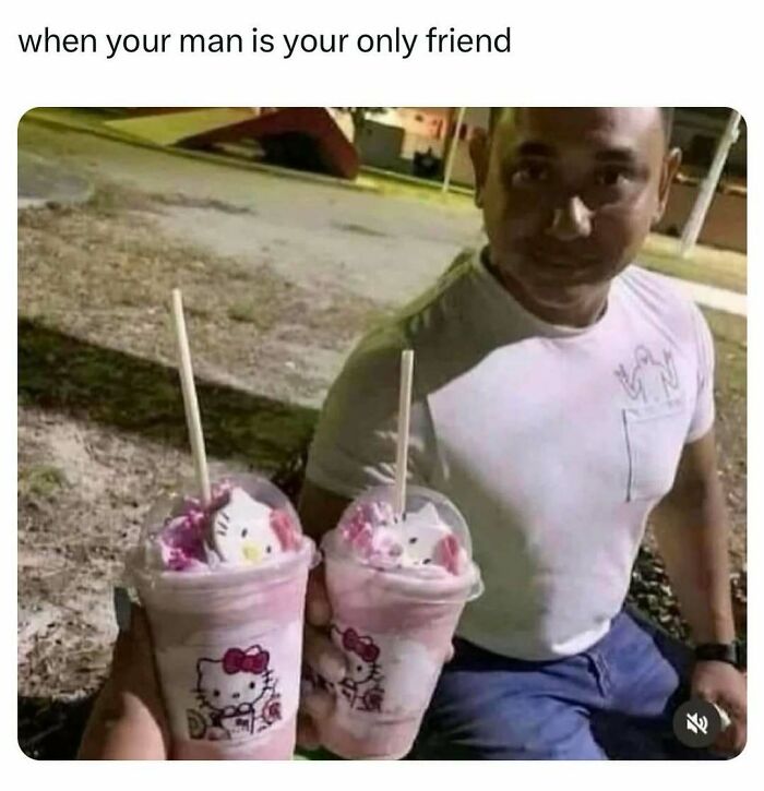 Man and woman holding matching Hello Kitty milkshakes, illustrating funny posts about barely holding it together.