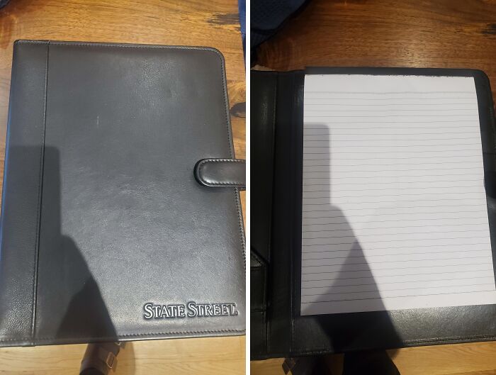 Company gift of a black leather notepad holder with lined paper inside, branded with "State Street."