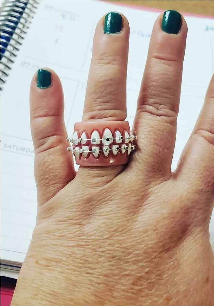 Weird secondhand find: a ring resembling dentures worn on a finger.