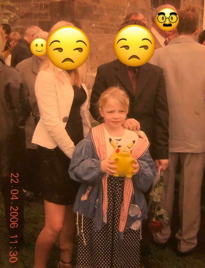 Child holding a Pikachu toy in vintage outfit among adults, part of people's regrettable past cringe-worthy pics collection.