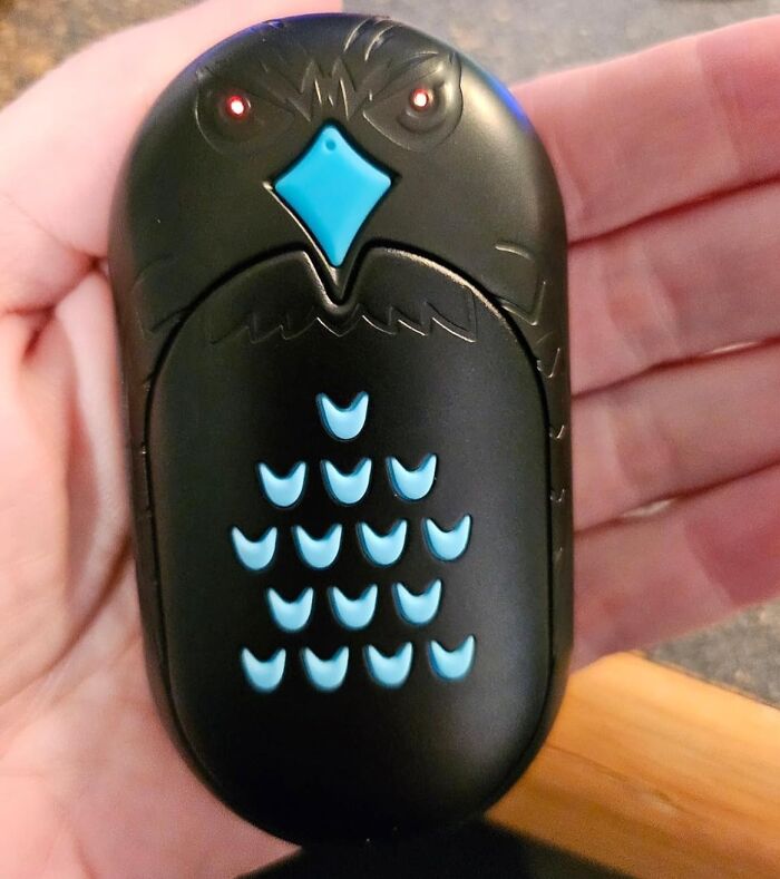 Owl-shaped remote control, a unique 5-star gadget under $20, held in a hand.