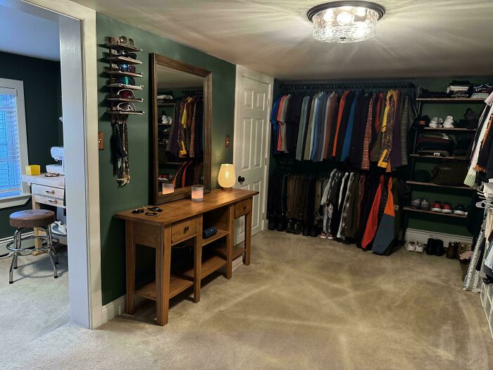 Neat closet with organized clothes, shoes, and accessories on shelves, exemplifying next-level organization.