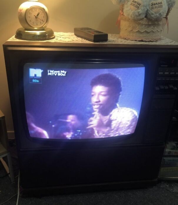 Retro TV showing 80s MTV music video, evoking nostalgia for the past.